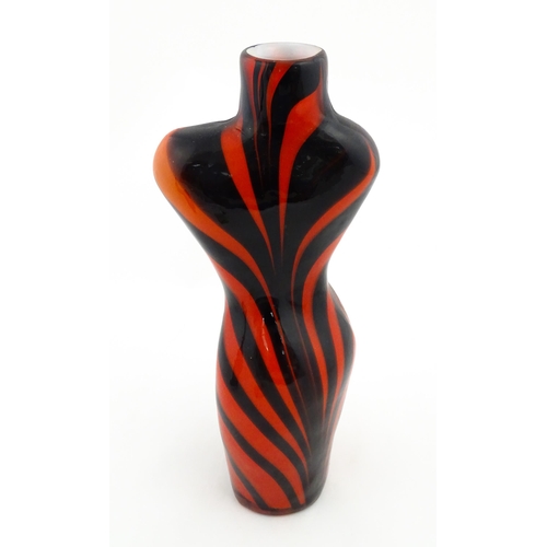 176 - A late 20thC glass vase modelled as a female torso with red and black detail. Approx 17 1/2