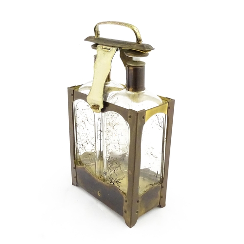 1084 - A 20thC musical decanter stand / carrier, containing two glass decanters. Approx. 11 1/2