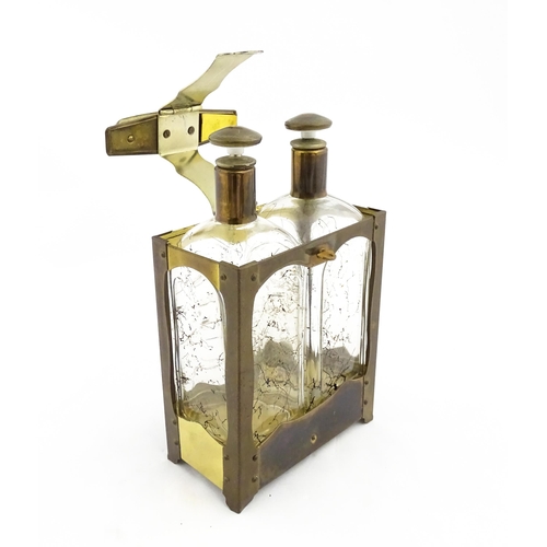 1084 - A 20thC musical decanter stand / carrier, containing two glass decanters. Approx. 11 1/2