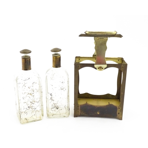 1084 - A 20thC musical decanter stand / carrier, containing two glass decanters. Approx. 11 1/2