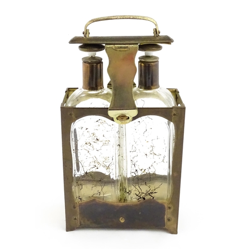 1084 - A 20thC musical decanter stand / carrier, containing two glass decanters. Approx. 11 1/2