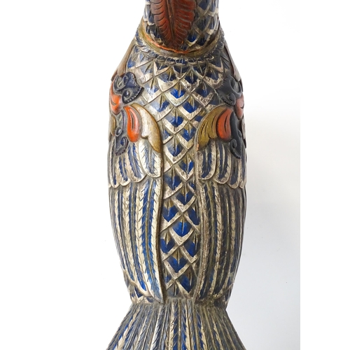 1234 - A very large 20thC carved wooden model of a goose with polychrome decoration. Approx. 50