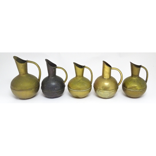 1246 - Three Arts and Crafts brass jugs by Henry Fearncombe of Wolverhampton, stamped to the bases 'H F & C... 