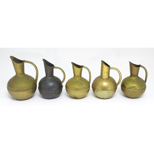 1246 - Three Arts and Crafts brass jugs by Henry Fearncombe of Wolverhampton, stamped to the bases 'H F & C... 