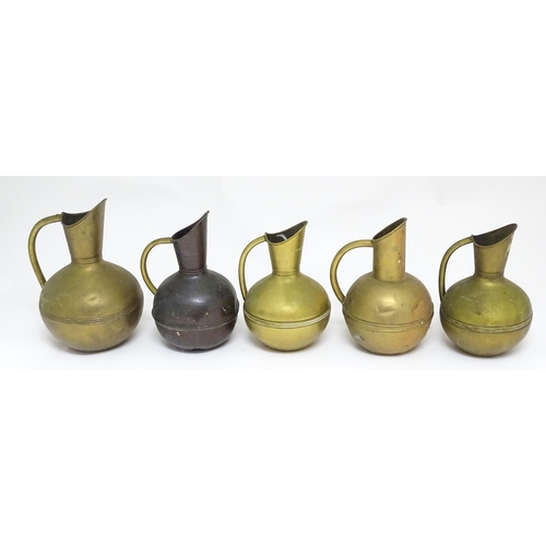 1246 - Three Arts and Crafts brass jugs by Henry Fearncombe of Wolverhampton, stamped to the bases 'H F & C... 