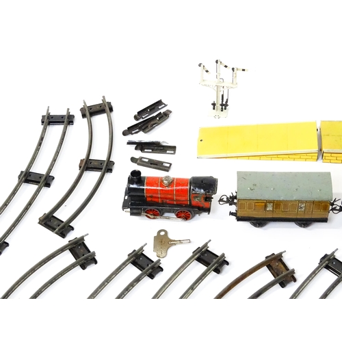 1297 - Toys - Model Train / Railway Interest : A quantity of Hornby tin plate O gauge railway items to incl... 