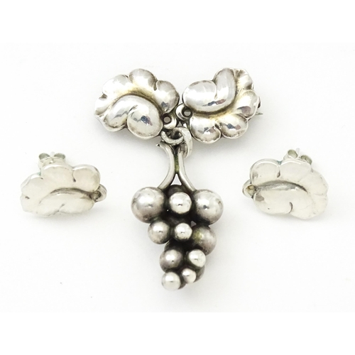 598 - Scandinavian Silver : A Danish Georg Jensen pair of earrings, marked Georg Jensen Sterling Denmark a... 