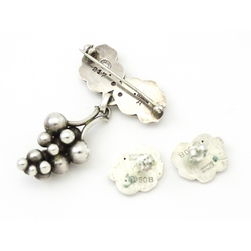 598 - Scandinavian Silver : A Danish Georg Jensen pair of earrings, marked Georg Jensen Sterling Denmark a... 