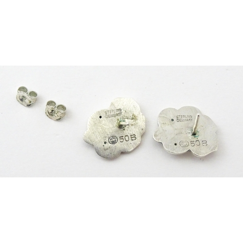 598 - Scandinavian Silver : A Danish Georg Jensen pair of earrings, marked Georg Jensen Sterling Denmark a... 