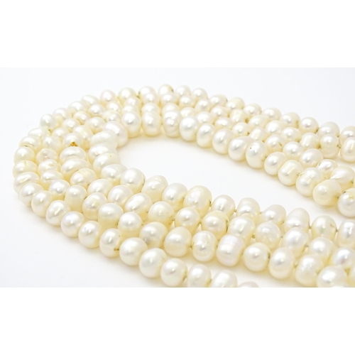 718 - A freshwater pearl necklace. Approx. 48