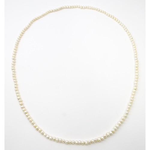 718 - A freshwater pearl necklace. Approx. 48