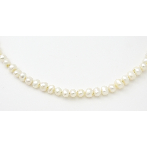 718 - A freshwater pearl necklace. Approx. 48