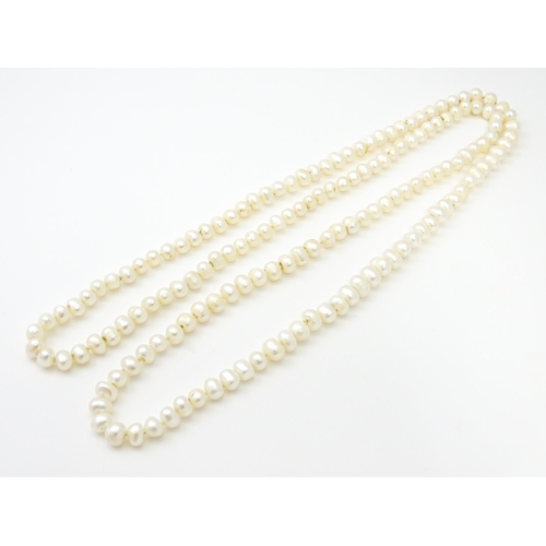 718 - A freshwater pearl necklace. Approx. 48