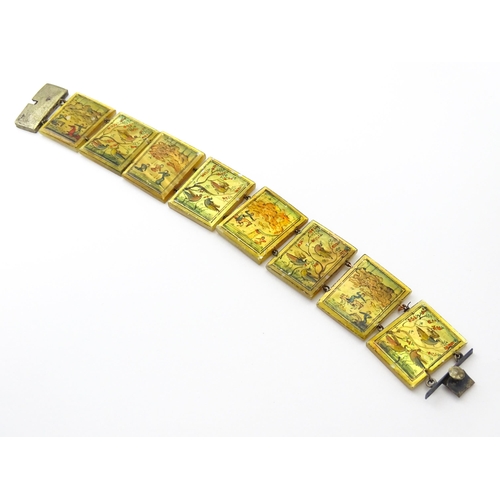 734 - An Indian bracelet with mother of pearl panels decorated  with scenes depicting figures, birds etc.