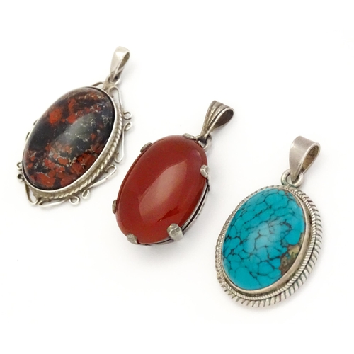 738 - Three various pendants to include agate, and turquoise examples. Largest approx. 1 1/4