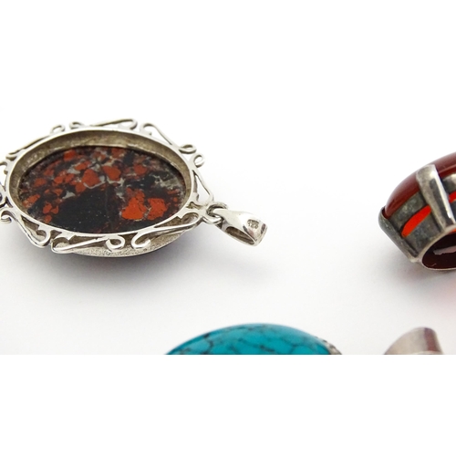 738 - Three various pendants to include agate, and turquoise examples. Largest approx. 1 1/4