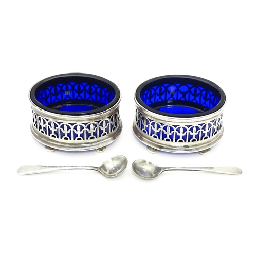 244 - A pair of silver salts with blue glass liners, hallmarked Birmingham 1925, maker John Collard Vicker... 