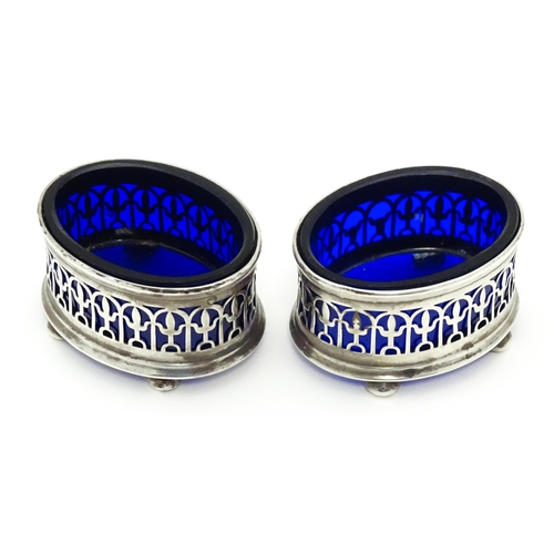 244 - A pair of silver salts with blue glass liners, hallmarked Birmingham 1925, maker John Collard Vicker... 