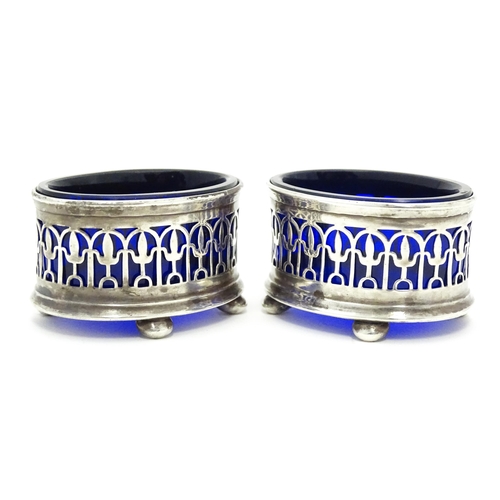 244 - A pair of silver salts with blue glass liners, hallmarked Birmingham 1925, maker John Collard Vicker... 