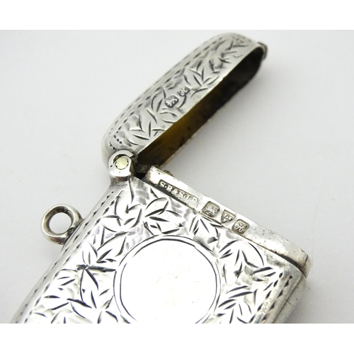 250 - A silver vesta case with engraved decoration. Hallmarked Chester 1908 maker S Blanckensee & Son Ltd.... 