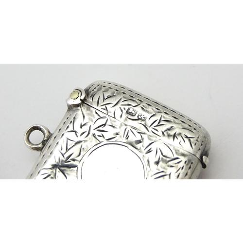 250 - A silver vesta case with engraved decoration. Hallmarked Chester 1908 maker S Blanckensee & Son Ltd.... 