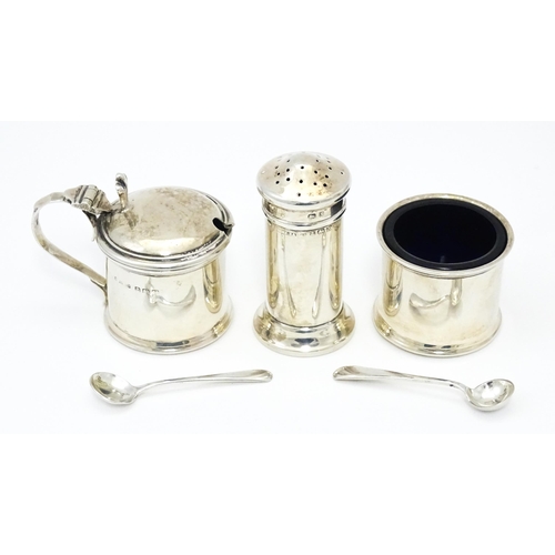 255 - A silver three piece cruet set comprising salt, pepper and mustard hallmarked Birmingham 1922, maker... 