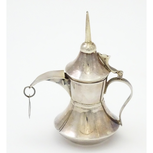 256 - A .925 silver model of a middle eastern Alishma dallah coffee pot. Approx. 3 3/4