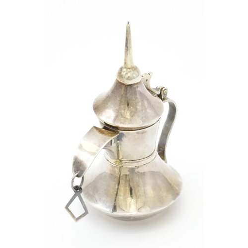 256 - A .925 silver model of a middle eastern Alishma dallah coffee pot. Approx. 3 3/4