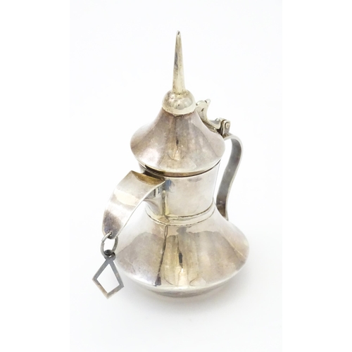 256 - A .925 silver model of a middle eastern Alishma dallah coffee pot. Approx. 3 3/4