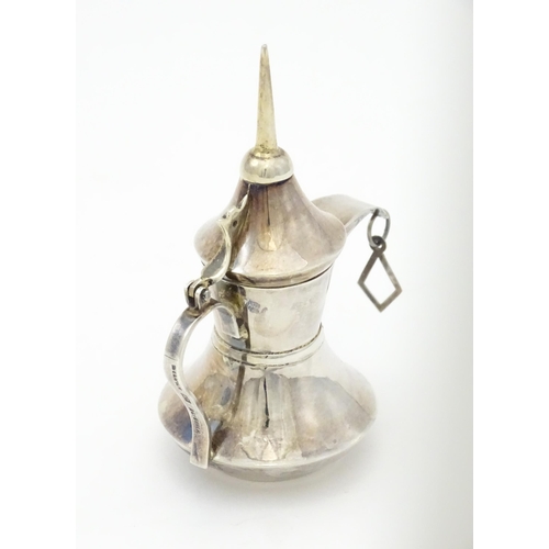 256 - A .925 silver model of a middle eastern Alishma dallah coffee pot. Approx. 3 3/4