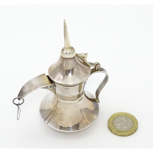 256 - A .925 silver model of a middle eastern Alishma dallah coffee pot. Approx. 3 3/4