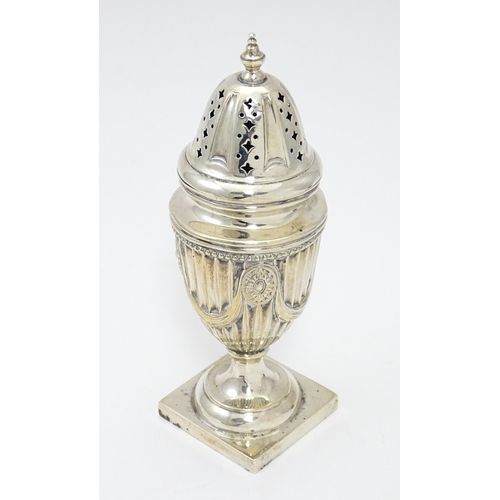 268 - A silver sugar caster the fluted body with swag detail, hallmarked Sheffield 1902, maker Hawksworth,... 