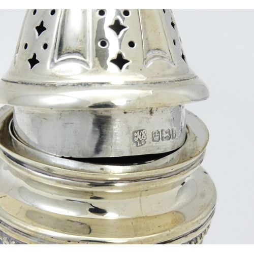 268 - A silver sugar caster the fluted body with swag detail, hallmarked Sheffield 1902, maker Hawksworth,... 