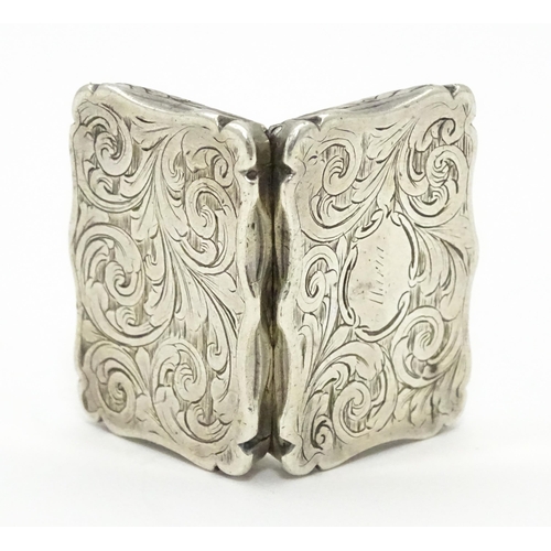 274 - A silver vinaigrette with acanthus scroll decoration. Hallmarked Birmingham 1845, maker Nathaniel Mi... 