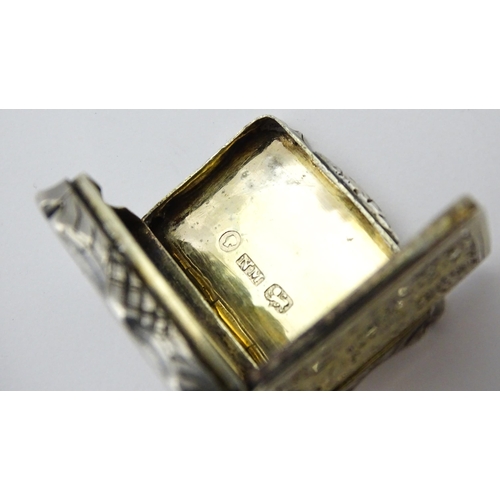 274 - A silver vinaigrette with acanthus scroll decoration. Hallmarked Birmingham 1845, maker Nathaniel Mi... 