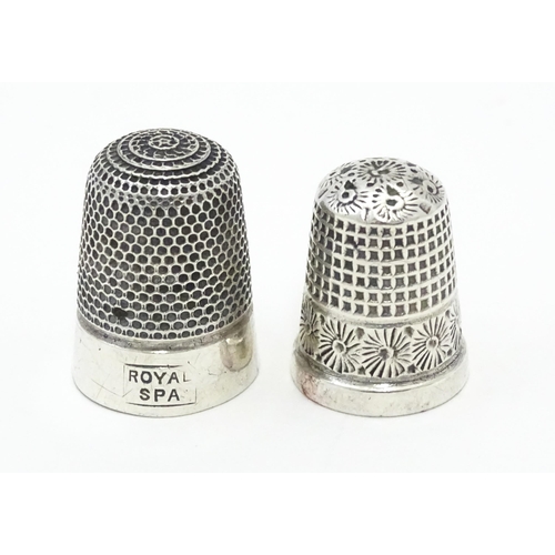 276 - A Victorian silver thimble hallmarked Birmingham 1898, maker Henry Griffiths & Sons Ltd. Together wi... 