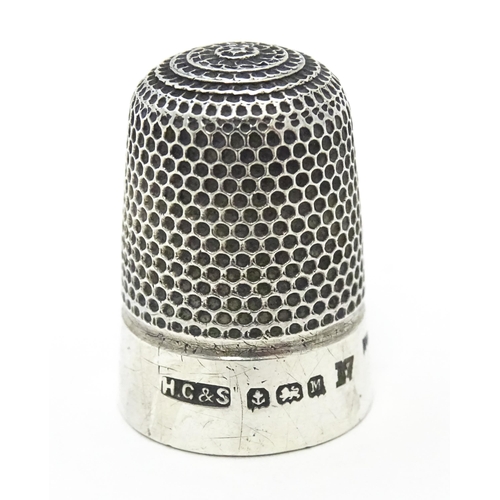 276 - A Victorian silver thimble hallmarked Birmingham 1898, maker Henry Griffiths & Sons Ltd. Together wi... 