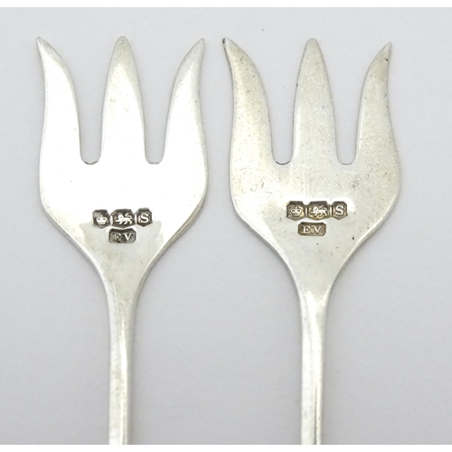 283 - Two silver cocktail / pickle forks with mother of pearl handles, hallmarked Sheffield 1935, maker Vi... 