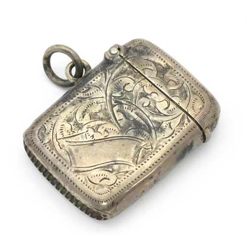 286 - A silver vesta case with engraved decoration hallmarked Birmingham 1902 maker Joseph Gloster. 1 1/2