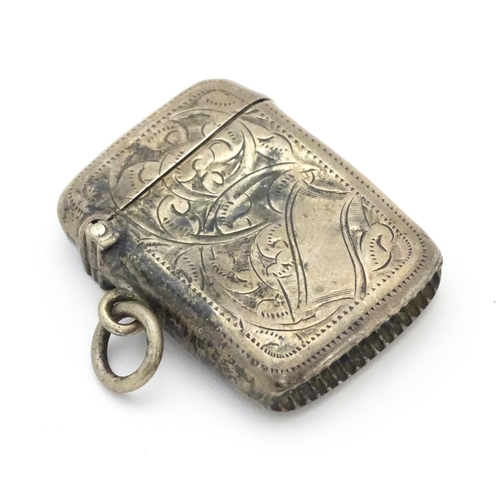 286 - A silver vesta case with engraved decoration hallmarked Birmingham 1902 maker Joseph Gloster. 1 1/2