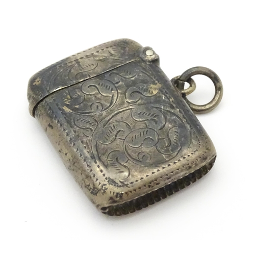 286 - A silver vesta case with engraved decoration hallmarked Birmingham 1902 maker Joseph Gloster. 1 1/2