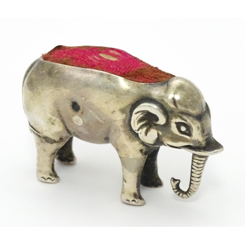 333 - A silver novelty pin cushion formed as an elephant. Hallmarked Birmingham 1905 maker M Bros. Approx ... 