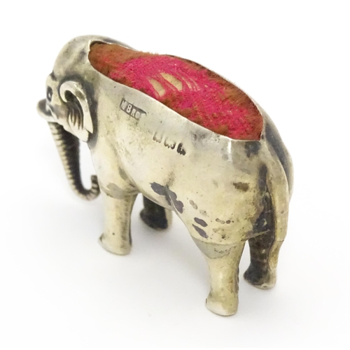 333 - A silver novelty pin cushion formed as an elephant. Hallmarked Birmingham 1905 maker M Bros. Approx ... 