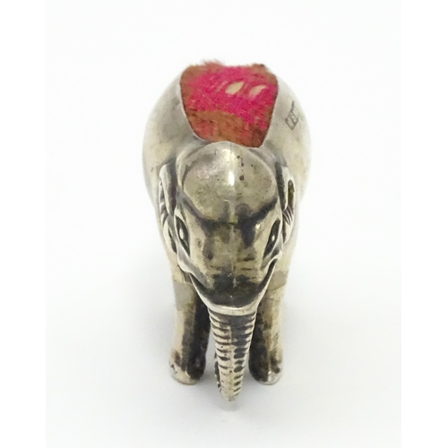 333 - A silver novelty pin cushion formed as an elephant. Hallmarked Birmingham 1905 maker M Bros. Approx ... 