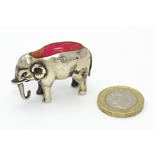 333 - A silver novelty pin cushion formed as an elephant. Hallmarked Birmingham 1905 maker M Bros. Approx ... 