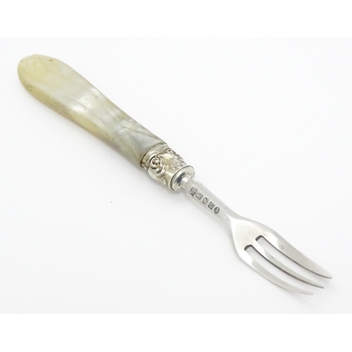 342 - A Victorian silver cake / pastry fork with mother of pearl handle, hallmarked Birmingham 1862, maker... 