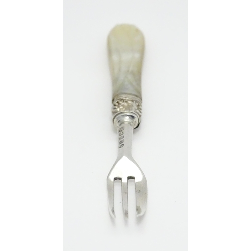 342 - A Victorian silver cake / pastry fork with mother of pearl handle, hallmarked Birmingham 1862, maker... 