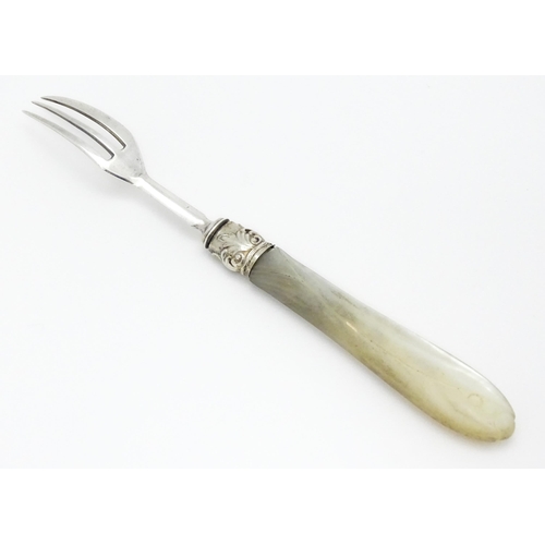 342 - A Victorian silver cake / pastry fork with mother of pearl handle, hallmarked Birmingham 1862, maker... 