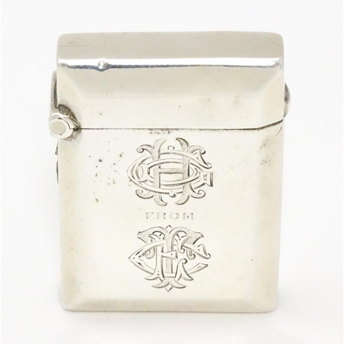 346 - A silver vesta case hallmarked Birmingham 1911 maker Rolason Brothers. Together with a silver napkin... 