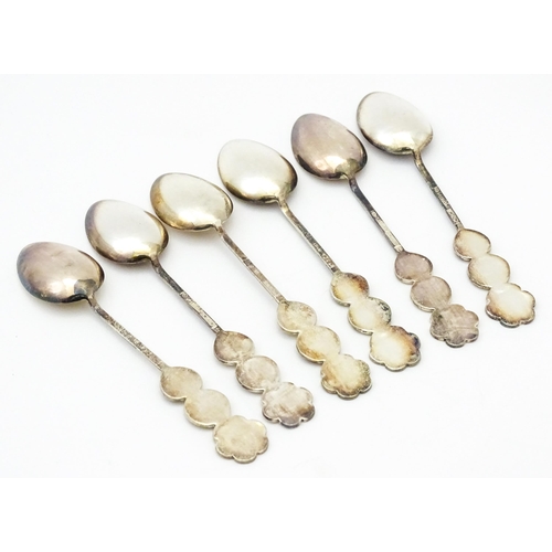 367 - A set of six Chinese export silver teaspoons with bamboo style handles decorated with Oriental chara... 